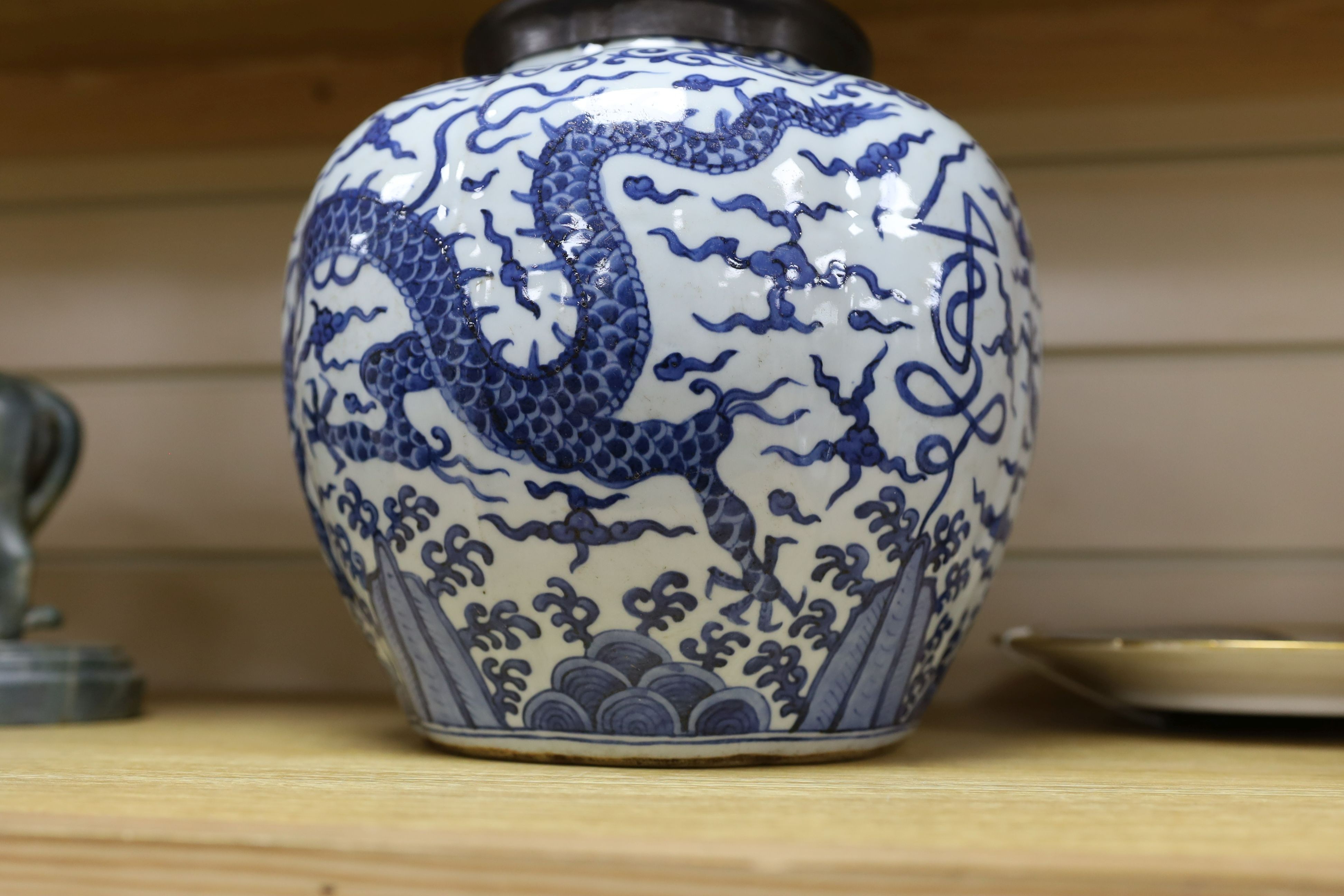 A Chinese blue and white ‘dragon jar, Wanli mark and possibly of the period, 23 cm high